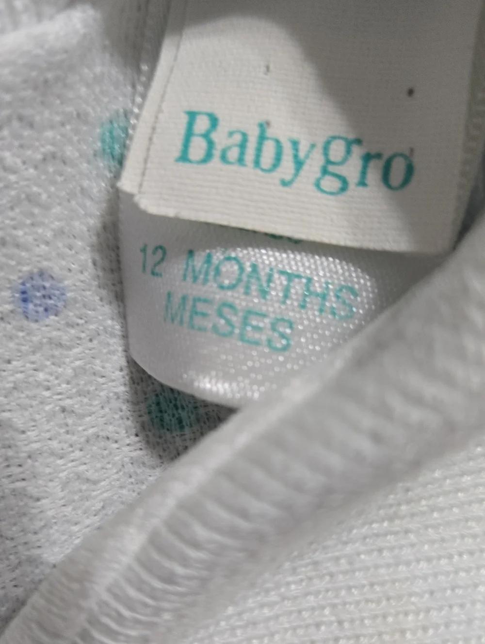 Vintage White Polka Dot Baby One-Piece with Blue Trim